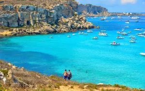Lace up your boots for a hike in picturesque Cala Rossa